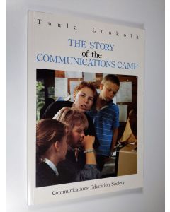 Kirjailijan Tuula Luokola käytetty kirja The story of the communications camp : research report from the communications camps, organized by Communications Education Society