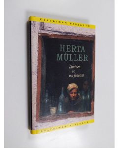 Kirjailijan Herta Müller käytetty kirja Ihminen on iso fasaani : kertomus
