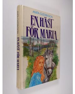 Kirjailijan Anita Gustavsson käytetty kirja En häst för Maria
