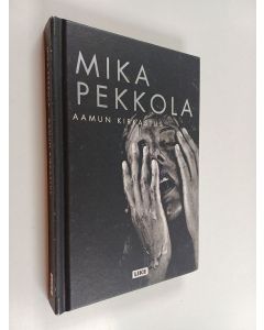 Kirjailijan Mika Pekkola käytetty kirja Aamun kirkastus