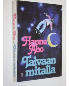 Kirjailijan Hannu Aho käytetty kirja Taivaan mitalla