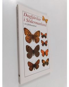 Kirjailijan Håkan Elmquist & Göran Liljeberg ym. käytetty kirja Dagfjärilar i Södermanland : ett projekt för att lära känna och studera dagflygande fjärilar