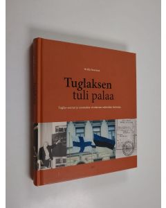 Kirjailijan Heikki Rausmaa käytetty kirja Tuglaksen tuli palaa : Tuglas-seuran ja suomalais-virolaisten suhteiden historia