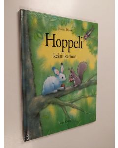 Kirjailijan Marcus Pfister käytetty kirja Hoppeli keksii keinon