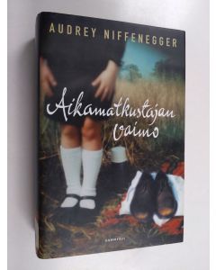 Kirjailijan Audrey Niffenegger käytetty kirja Aikamatkustajan vaimo