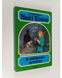 Kirjailijan Carolyn Keene käytetty kirja Neiti Etsivä ja valokuvan arvoitus