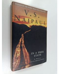 Kirjailijan V. S. Naipaul käytetty kirja In a free state