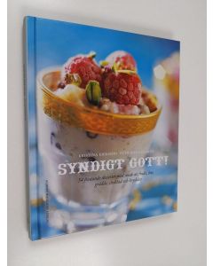 Kirjailijan Kristina Eriksson käytetty kirja Syndigt gott! : 54 frestande desserter med smak av frukt, bär, grädde, choklad och kryddor