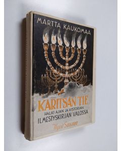 Kirjailijan Martta Kaukomaa käytetty kirja Karitsan tie : halki ajan ja historian Ilmestyskirjan valossa