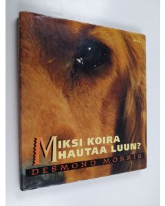 Kirjailijan Desmond Morris käytetty kirja Miksi koira hautaa luun?