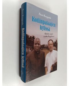 Kirjailijan Ossi Kuoppala käytetty kirja Kotiinpalaajien kylissä : kahden papin matka Angolassa