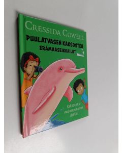 Kirjailijan Cressida Cowell käytetty kirja Puulatvasen kaksosten erämaaseikkailut : Kaksoset ja vaaleanpunainen delfiini