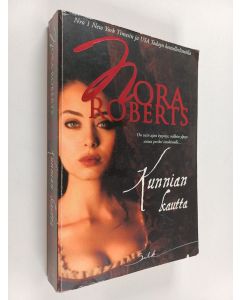 Kirjailijan Nora Roberts käytetty kirja Kunnian kautta