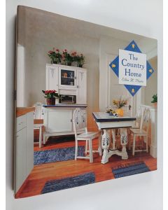 Kirjailijan Ellen M. Plante käytetty kirja The Country Home