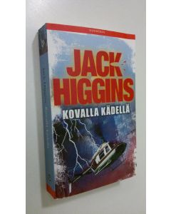 Kirjailijan Jack Higgins käytetty kirja Kovalla kädellä