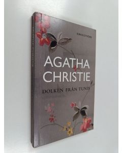 Kirjailijan Agatha Christie käytetty kirja Dolken från tunis