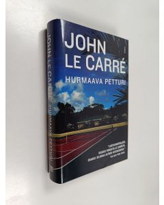 Kirjailijan John Le Carre käytetty kirja Hurmaava petturi
