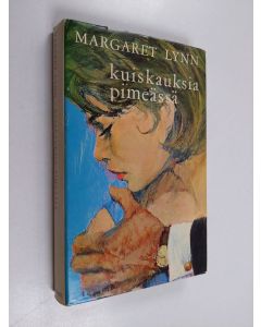 Kirjailijan Margaret Lynn käytetty kirja Kuiskauksia pimeässä