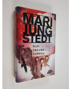 Kirjailijan Mari Jungstedt käytetty kirja Kun taivas tummuu