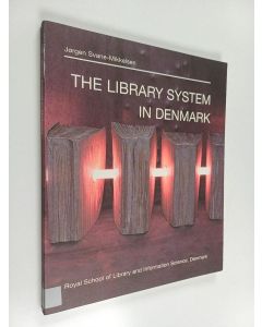 Kirjailijan Jørgen Svane-Mikkelsen käytetty kirja The library system in Denmark