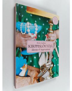 Kirjailijan Karin Lindroos käytetty kirja Kirppislöytöjä : ideoita & inspiraatiota
