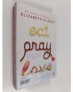 Kirjailijan Elizabeth Gilbert käytetty kirja Eat, pray, love : one woman's search for everything
