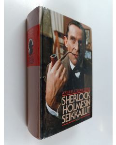 Kirjailijan Arthur Conan Doyle käytetty kirja Sherlock Holmesin seikkailut 1-2 (yhteissidos)