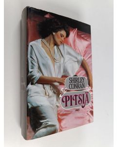 Kirjailijan Shirley Conran käytetty kirja Pitsiä