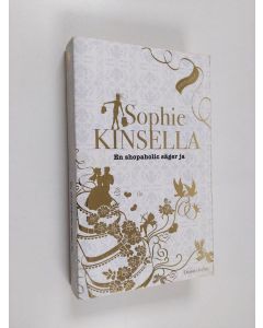 Kirjailijan Sophie Kinsella käytetty kirja En shopaholic säger ja