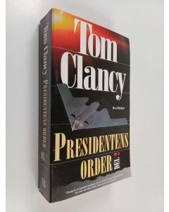 Kirjailijan Tom Clancy käytetty kirja Presidentens order del 2