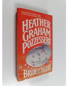 Kirjailijan Heather Graham Pozzessere käytetty kirja Bride of the Tiger