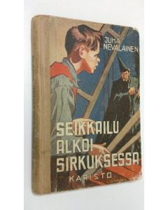 Kirjailijan Juha Nevalainen käytetty kirja Seikkailu alkoi sirkuksessa : seikkailukertomus nuorisolle Humpsin kolmosvoitosta eräitten keväisten päivien ja vähän öittenkin vieriessä
