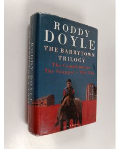Kirjailijan Roddy Doyle käytetty kirja The Barrytown trilogy : The commitments, The snapper, The van