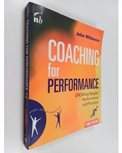 Kirjailijan John Whitmore käytetty kirja Coaching for performance growing people, performance and purpose