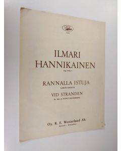 Kirjailijan Ilmari Hannikainen käytetty teos Rannalla istuja, Vid stranden