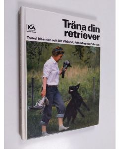 Kirjailijan Torkel Näsman & Ulf Viklund käytetty kirja Träna din retriever