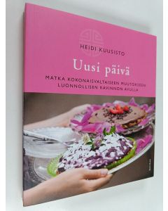 Kirjailijan Heidi Kuusisto käytetty kirja Uusi päivä : matka kokonaisvaltaiseen muutokseen luonnollisen ravinnon avulla