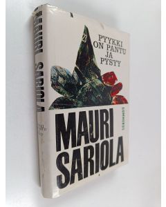 Kirjailijan Mauri Sariola käytetty kirja Pyykki on pantu ja pysyy