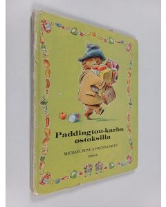 Kirjailijan Michael Bond käytetty kirja Paddington-karhu ostoksilla