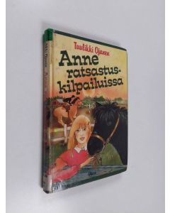 Kirjailijan Tuulikki Ojanen käytetty kirja Anne ratsastuskilpailuissa