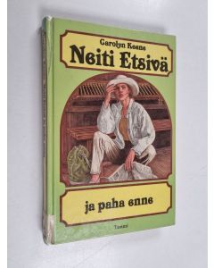 Kirjailijan Carolyn Keene käytetty kirja Neiti Etsivä ja paha enne