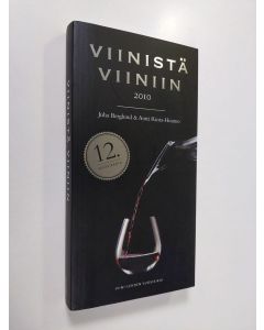 Kirjailijan Juha Berglund käytetty kirja Viinistä viiniin 2010 : Viini-lehden vuosikirja