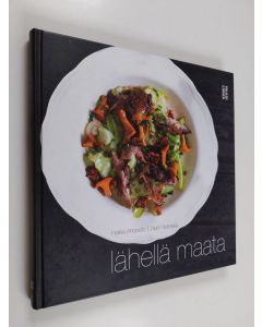 Kirjailijan Heikki Ahopelto käytetty kirja Lähellä maata