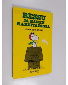 Kirjailijan Charles M. Schulz käytetty kirja Ressu ja hänen kaksitasonsa