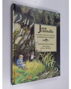 Kirjailijan Kenneth Grahame käytetty kirja Joen rannalla ja muita tarinoita teoksesta Kaislikossa suhisee