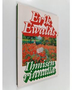 Kirjailijan Erik Ewalds käytetty kirja Ihmisen rinnalla