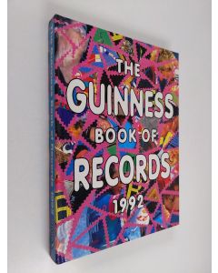 Kirjailijan Norris McWhirter & Donald McFarlan käytetty kirja The Guinness Book of Records 1992