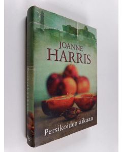 Kirjailijan Joanne Harris käytetty kirja Persikoiden aikaan