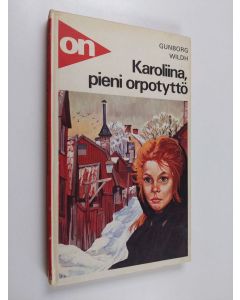Kirjailijan Gunborg Wildh käytetty kirja Karoliina, pieni orpotyttö