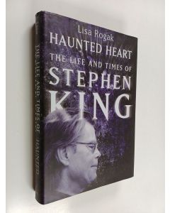 Kirjailijan Lisa Rogak käytetty kirja Haunted heart the life and times of Stephen King